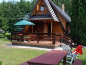 Domek całoroczny nad jeziorem. W Ińskich Parkach Krajobrazowych